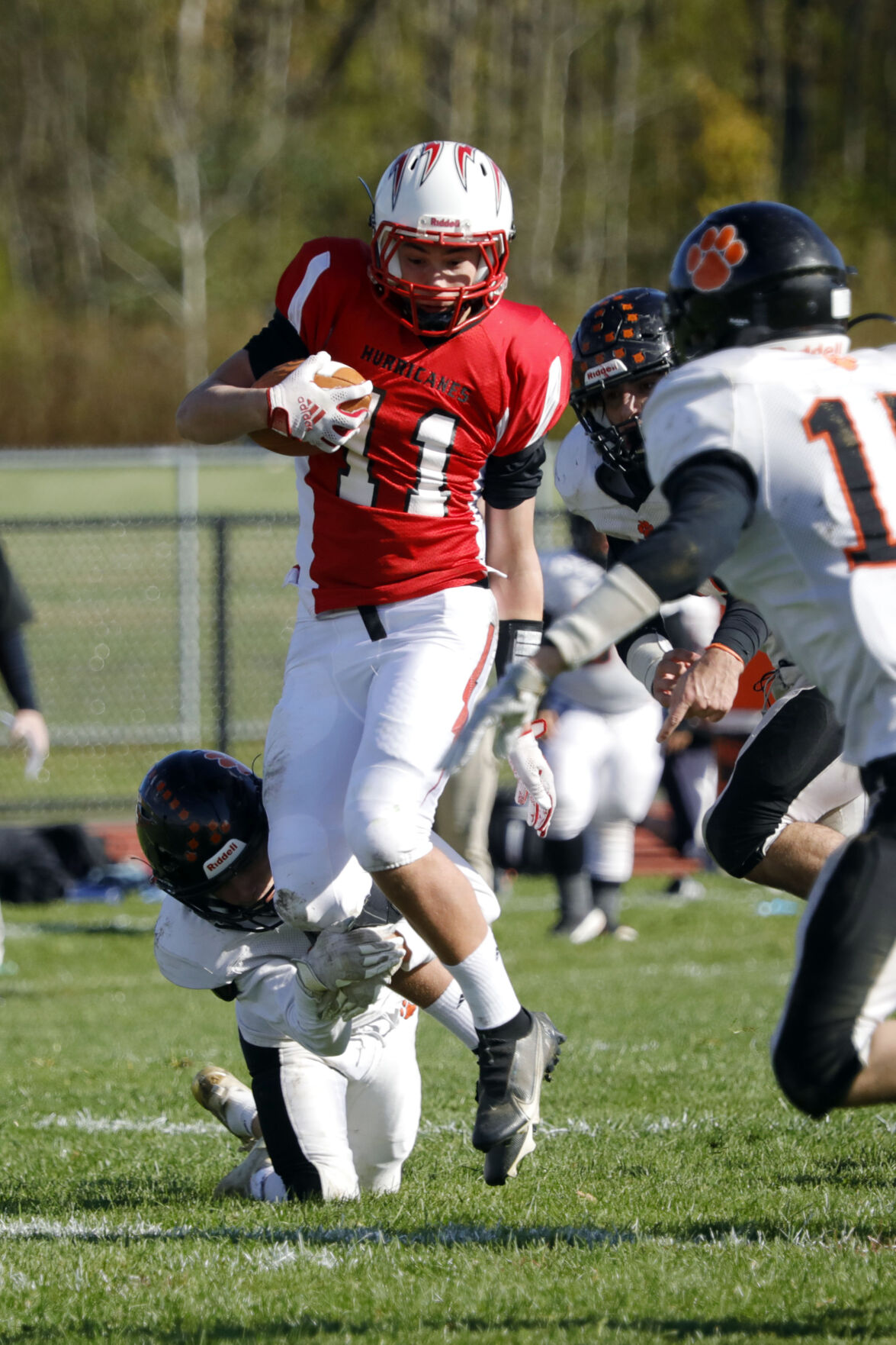 frank field jumps with football